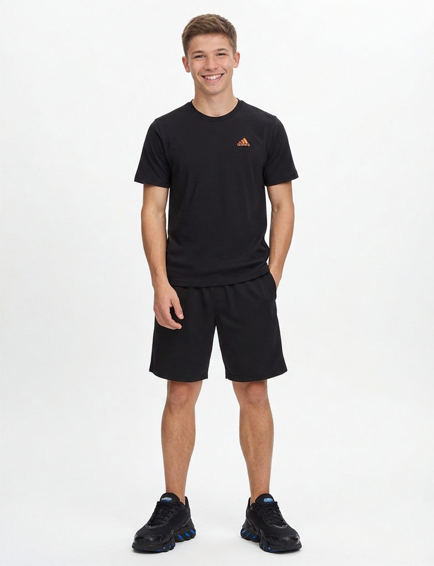 Este conjunto deportivo, con camiseta y pantalones cortos negros,… · Outfit de Nicolas López Roman